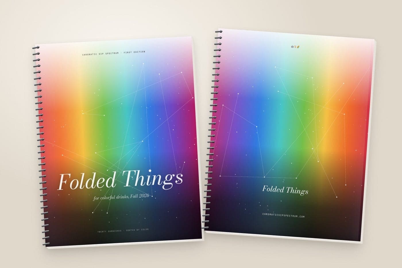 The Folded Things coil-bound book, front and back covers: a rainbow spectrum with the title in italic serif.